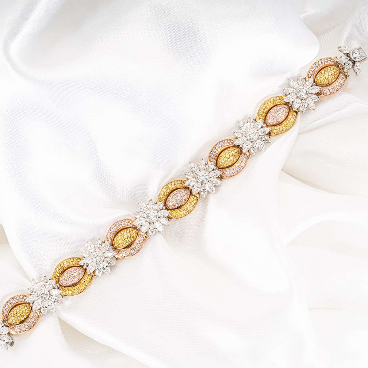 Tri-Colour Gold Fancy Yellow, Natural Pink & White Diamond Bracelet